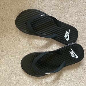 Nike women’s flip flops.